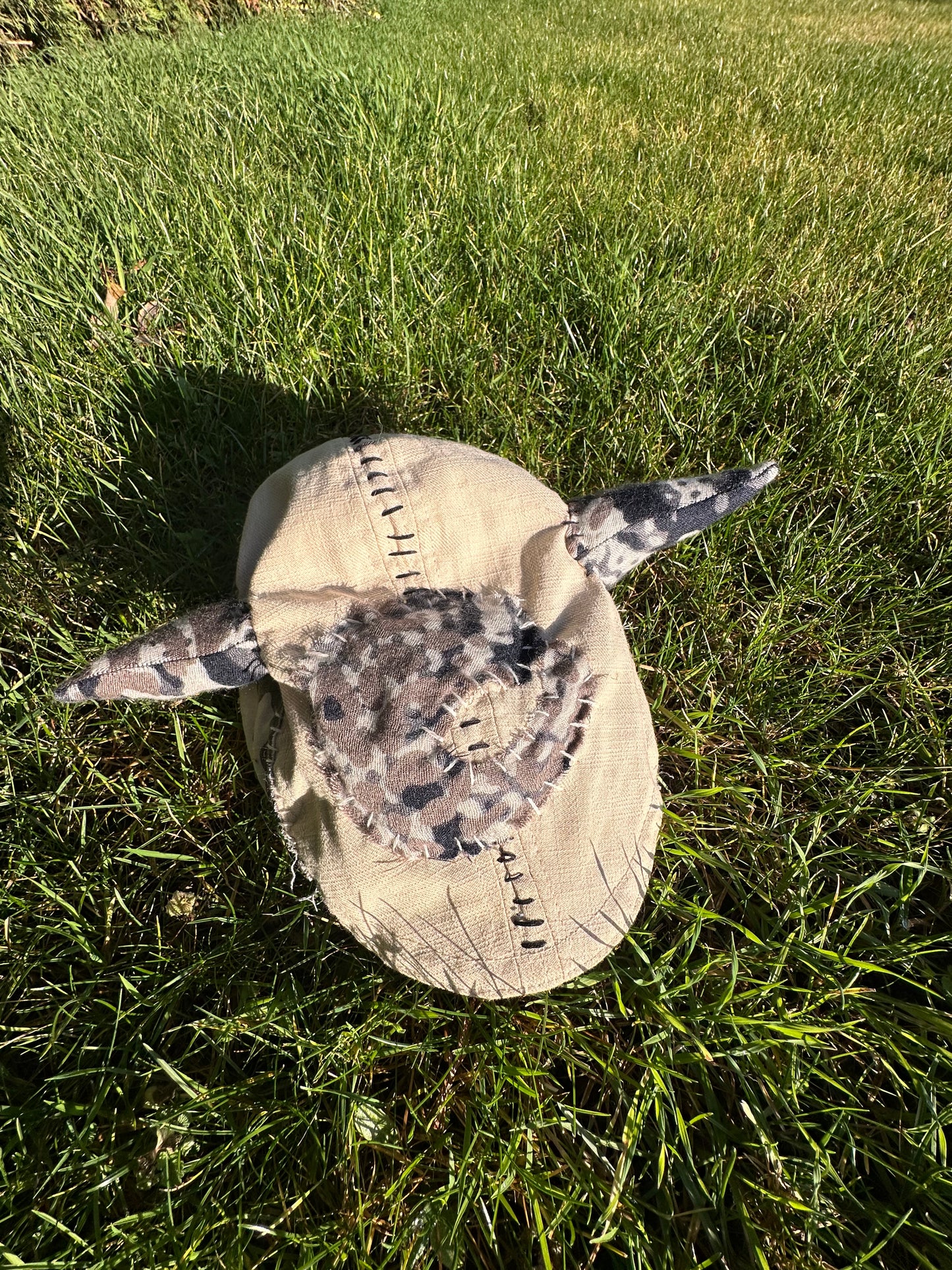 Camo creature Flatcap