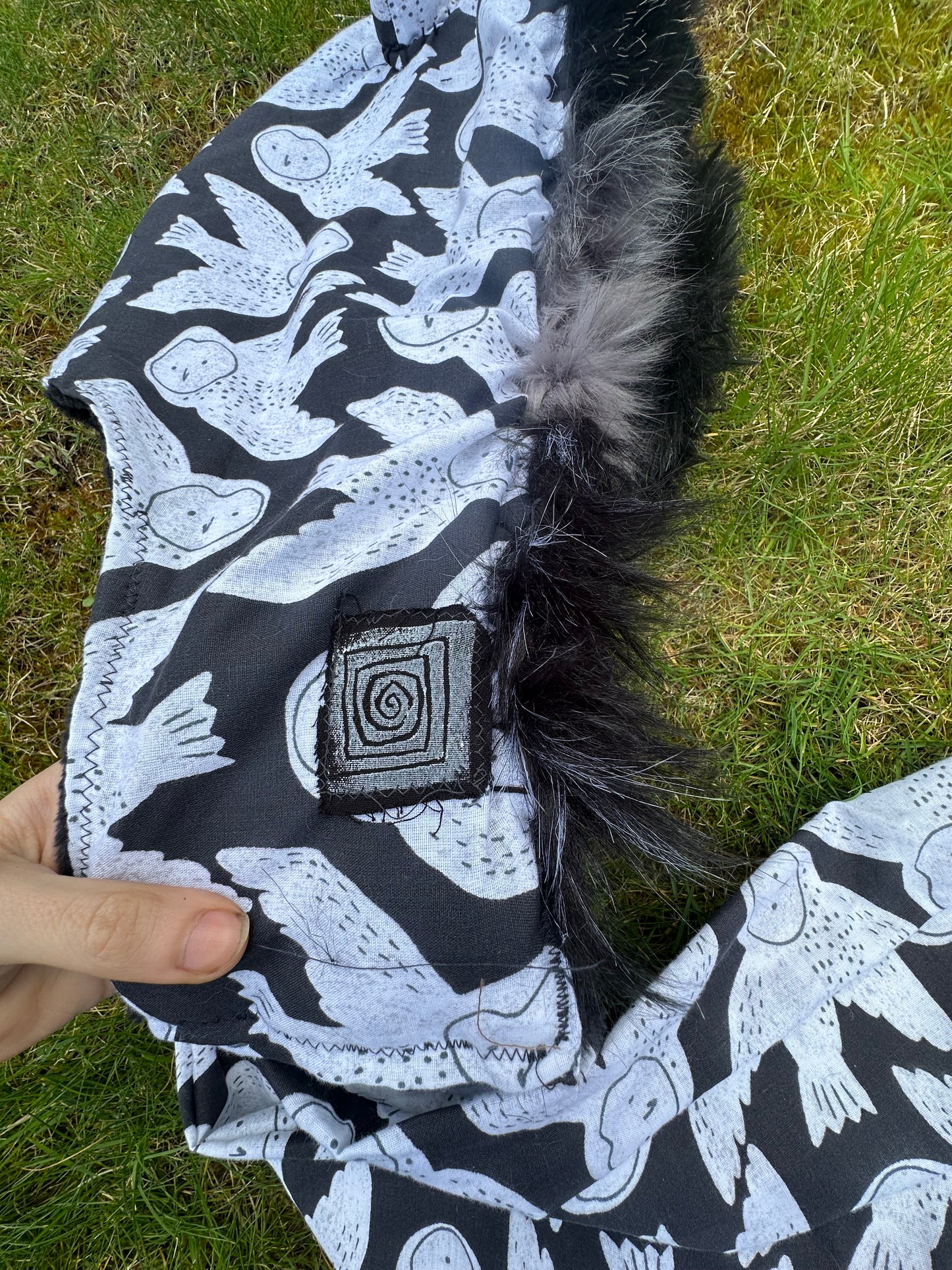 Optical owl hood